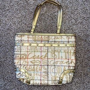 COACH Gold purse with many pockets